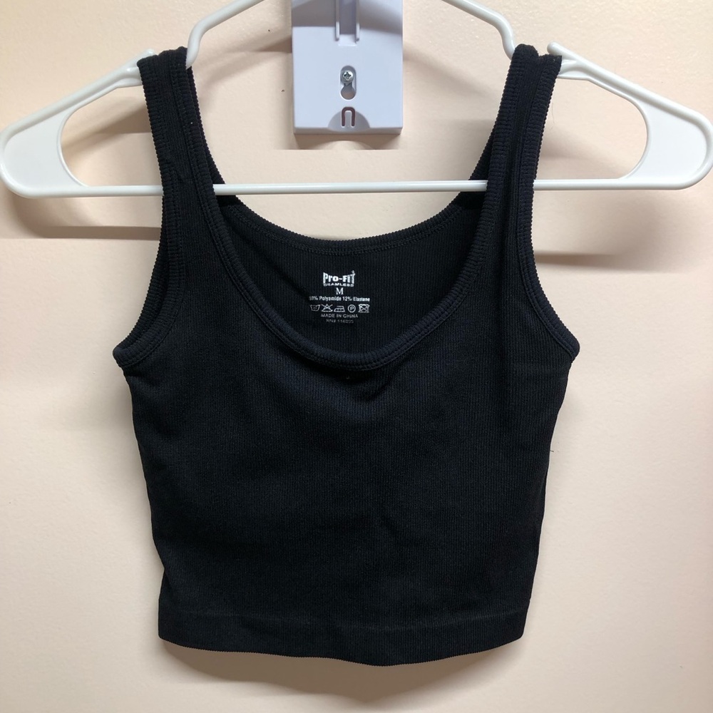 Cropped ribbed black tank top with built in sports bra
